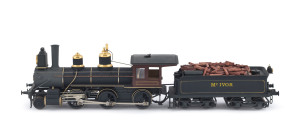 Victoria c.1906 Baldwin Steam Locomotive plus tender containing timber (total size 200x38x50mm), black & brown livery with gold plated trim, 2-6-0 wheel configuration, built by Baldwin Locomotive Works (Philadelphia) for the McIvor Timber and Firewood Company for use on their private 5ft 3in broad gauge tramway, which branched off the Wallan-Bendigo cross country line at Tooborac, near Heathcote, Victoria.