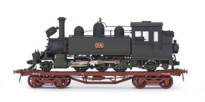 c.1900 Type 3A Tank Locomotive "Puffing Billy" with green livery, assembled at the Newport Works, commencing service on 23rd April 1900, initially used in the construction of the Upper Ferntree Gully to Gembrook "Puffing Billy" narrow gauge railway line. The locomotive is being carried on a 1926 "Q" class Transporter Wagon (Q129), a unique wagon used to transport 2ft 6ins narrow gauge rolling stock over Victorian broad gauge track to narrow gauge railway lines, total size (144x34x55mm). (2 items