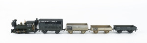 1886 Shunt Engine (82x29x40mm), road number '107', built at the Baldwin Locomotive Works (Philadelphia), black livery with gold plated trim, 0-4-0 wheel configuration, known colloquially as "Sandfly", with rolling stock comprising four goods carriages. (5 items)
