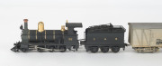 1890 Y Class Tender Locomotive 'Y92' (170x35x50mm), built by Beyer, Peacock, black livery with gold plated trim, 2-6-0 wheel configuration, with rolling stock comprising two goods carriages plus passenger carriage and guard van, withdrawn from service in - 2