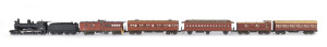 1914 G/GA Class tender steam locomotive, road number '9' (235x38x58mm) built at the Baldwin Locomotive Works (Philadelphia) black livery, 4-6-0 wheel configuration with three passenger carriages plus two guard vans (total size with carriages 780x38x58mm). (7 items)