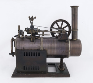 c.1920 Falk Overtype stationary Steam Engine, Type 143F (stamped on base), burnished brass boiler, 10cm diameter flywheel, mounted on cast iron base painted green; 23½x13½cm base, height 29cm, weight 2.66kg.