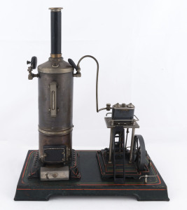 c.1930 Doll vertical marine type double cylinder steam engine, with whistle safety valve, catwalk and ladder, mounted on cast iron base painted dark green with red and pale green decal, 29x16cm,base, height 34cm, weight 1.9kg.