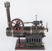 c.1920 Falk Overtype stationary Steam Engine Type 150FJ, 7cm diameter burnished brass boiler, 7½cm flywheel, mounted on cast iron base painted red; 18½x12½cm base, height 27cm, weight, weight 1.77kg.