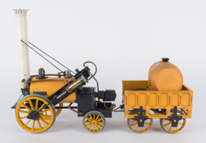 Late 1970s Hornby model of G100 Stephenson's Rocket, 3½inch gauge, gas fired through a small cylinder hidden inside the dummy water barrel on back of the tender; 41x13cm, height 29cm, weight 2.90kg.