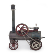 c.1925 Bing Steam Traction Engine, fixed cylinder, burnished brass boiler, 8cm flywheel, complete with burner, 24x12cm, height 29½cm, weight 1.15kg.