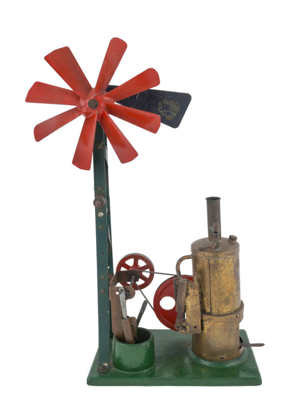 Early 1950s rare Australian made Renown toy steam windmill with vertical brass steam engine driving a water pump and windmill through a brass pulley, mounted on a cast iron base (19x12cm), height 41cm, weight 2.2kg.