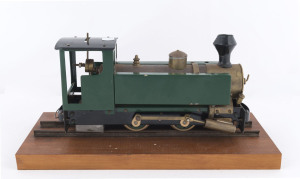 c.1950s scratch built model steam train (28x8x13cm, weight 1.55kg) constructed from brass, copper & tin plate, mounted on track on a wooden stand, "Anthony Hordern & Sons/Sydney" name plate on front of the engine, total weight, including stand, 2.20kg.