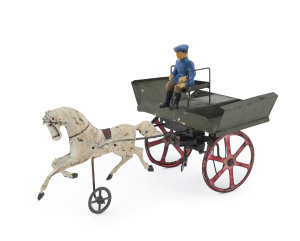 Tinplate horse and cart wind-up toy, probably Gunthermann, late 19th century. Hand painted cart with spoked wheels and folding side-flaps; seated composition driver, the horse mounted on a small single wheel. Length: 24cm (9.5").