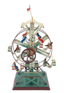 Doll & Cie painted and embossed tin Ferris wheel mechanical toy, with six gondolas, each with a single painted composition rider; much restoration, presents beautifully. Height: 40cm (16").
