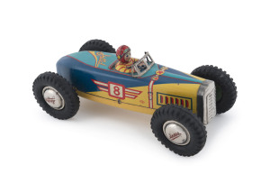 Tin plate friction open wheel boat-tail Speed Racer No.8 with driver; by Nomura and marked "MADE IN OCCUPIED JAPAN"; circa 1950. Length: 22cm (8.5").