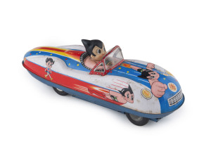 ASTROBOY ROBOT SPEED RACER LITHOGRAPHED TIN FRICTION TOY, TAIKO SOUND, 1960s. Made by Masudaya. Length: 31.5cm (12.5").