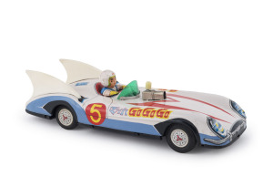Aoshin Go Go Go Mach 5 racer with driver; tinplate with plastic fins and windscreen; Made in Japan, circa 1960s. Length: 28cm (11").