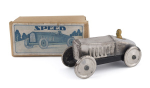 All silver "SPEED" racer with driver; friction powered in original box by Kohno Kakuzo, Japan; circa 1930s. With KK propellor logo on the chassis (behind the driver) and on the box label. Extremely scarce; the only other example known to the vendor is in 