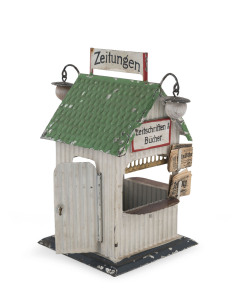 BING "Zeitungen" Newspaper & Book stand, O Gauge, remarkably with the two original hanging lamps and with three miniature newspapers. Height: 14cm (5.5").