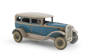 Wind-up TippCo saloon tinplate lithographed with driver and electric (battery powered) headlights; Germany circa 1930s; with "TC 9481" numberplate. Length: 23cm (9").
