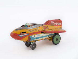 WINNER - 23 battery-powered tinplate rocket ship, made by Kyodo with "KDP" logo. 