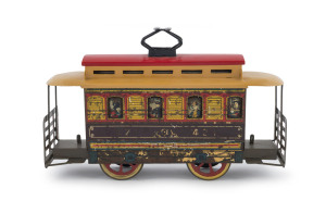 Antique Japanese tinplate lithographed keywind trolley street car with passengers and numbered "421" with Japanese passengers. Sensitively restored. Length: 20cm (8").