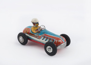 "FIRE STONE" No.21 racer, lithographed tinplate friction driven car with driver and rubber tyres, by Yonezawa, Japan, circa 1960. Length: 15cm (6").