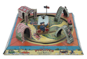 VINTAGE 1930s LOUIS MARX & CO "PINCHED" WIND-UP TIN LITHO TABLE-TOP TOY The toy originally sold for 98¢ and was available for only several months through the Sears Winter catalogue. Its low production numbers were most likely due to the complexity of the 