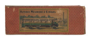 "Autobus Mecanique a 6 Roues" tin-plate omnibus operating the Madelaine to Bastille route, made by J.de P (Jouets de Paris), complete with winding key and bus driver & original box showing the operating instructions on the inside lid. circa 1920s. Length - 2