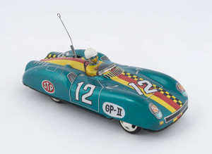 ALPS tinplate racing car, friction motor in working order, unusually with the windshield & the antennae intact and undamaged, marked '"ALPS/MADE IN JAPAN" on chassis; circa 1960s. Length 21.5cm (8.5")
