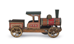 Vintage tinplate lithographed floor locomotive, integrated wind-up mechanism below boiler; numbered "275"; maker unknown. Length: 18cm (7").