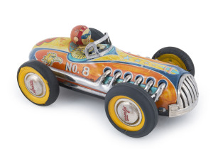 YONEZAWA friction powered "No 8 Rocket" racer, vivid paintwork in orange, yellow, light & dark blue, two tyres replaced otherwise appears to be in original condition, company trade marks at back of car. Circa 1950; length 30cm (12"). Rare.