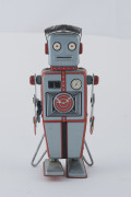 YONEZAWA (LINE MAR) lithographed tinplate robot with easel-back support frame which provides stability when robot is in motion, circa. late 1950s, height 16&frac12;cm (6.5"). - 2