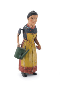 GUNTHERMANN (attributed) lady with watering can; wind-up tin-plate hand painted antique toy. Height: 18.5cm (7.25").