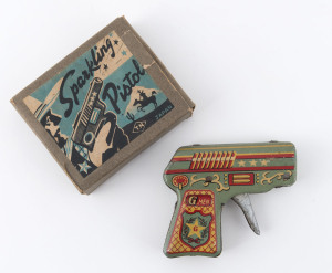 "G Men" sparkling pistol by Nomura (Japan), gum still sparkles, original box, with 'T.N.' trademark, is illustrated with a cowboy scene, circa 1950s, length 9cm (3.5").