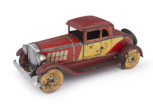 Hudson 2-door Coupé tinplate toy car, wind-up mechanism with a fixed key by Kosuge (Japan), in working order, original body paint, circa 1930s, length 28cm (11"). Rare.