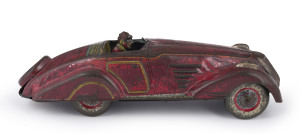 1930s open-top streamlined sports coupé with driver, made in Japan featuring an unusual wind-up mechanism, length 27cm (10.5").