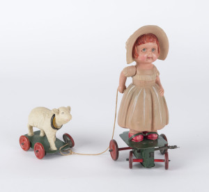 Little Bo Peep, vintage painted tin and celluloid wind-up toy on two wheeled platforms; made by OHTA, Japan ("K" in diamond trademark). Height: 17cm (6.75").