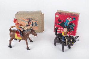 Horse & cowboy wind-up, the cowboy in celluloid with pistol in one hand, horse in tinplate marked "MADE IN OCCUPIED JAPAN" on the saddlecloth, leather tail, with illustrated original box, circa late 1940s; also 1950s wind-up "Bucking Bronco" made by Mode