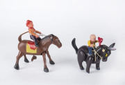 Horse & cowboy wind-up, the cowboy in celluloid with pistol in one hand, horse in tinplate marked "MADE IN OCCUPIED JAPAN" on the saddlecloth, leather tail, with illustrated original box, circa late 1940s; also 1950s wind-up "Bucking Bronco" made by Mode - 2
