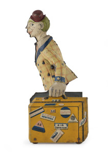Clockwork lithographed tin-plate wind-up bell-hop boy with two suitcases and a red cap. Height: 19cm (7.5").