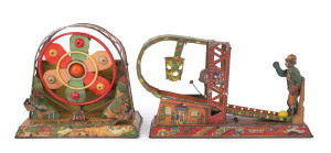 Fairground attraction tinplate & celluloid wind-ups by Kuramochi (Japan, 'CK'-in diamond trademarks) comprising a "Kick-into-a-basket" game with the mechanism triggering a tinplate figure to kick a celluloid ball into a hanging basket, length 22cm (8.75"), height 13cm (5"); also a seesaw with two seated figures set against a high backdrop featuring a spinning circular frame containing a fan-like structure decorated with coloured celluloid balls, length 17cm (6.75"), height 15cm (6");