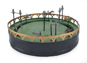 Vintage table-top horse-racing gambling game, French (?) painted metal, with six horse spinning around a circular track. Diameter: 25cm (10").