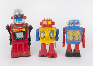 Trio of battery operated Japanese made robots comprising Cragstan's tinplate "Mr Robot" c.1960s, height 28cm (11") plus c.1970s Horikawa (Japan) plastic "Sky" & "Gear" robots, height of both 22cm (9"); all appear to be intact with no missing parts. (3 items)