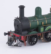 1872 No 100 Steam Locomotive (190x35x50mm) built at the temporary Williamstown Workshops and destined to haul the Commissioner's Train, dark green livery with gold trim, 2-4-0 wheel configuration, with rolling stock comprising four wagons, one open wagon - 3