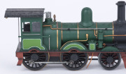 1872 No 100 Steam Locomotive (190x35x50mm) built at the temporary Williamstown Workshops and destined to haul the Commissioner's Train, dark green livery with gold trim, 2-4-0 wheel configuration, with rolling stock comprising four wagons, one open wagon - 5