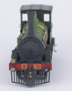 c.1875 Q Class (Q83) Steam Locomotive (195x35x50mm), green livery with gold trim, 0-6-0 wheel configuration, with rolling stock comprising two 'D' class Guard Vans and four freight wagons containing aggregate, total size 700x35x50mm. (8 items) - 5