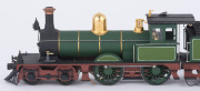 c.1877 D Class (D122) passenger Steam Locomotive (205x40x55mm) built by Rogers (Paterson, NJ, USA), dark green livery with gold plate trim, 4-4-0 wheel configuration, with rolling stock comprising five goods carriages and a YH guard passenger at the back, - 3