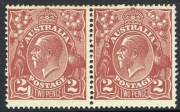 AUSTRALIA: KGV Heads - Single Watermark: 2d Red-Brown, horizontal pair (2), the left unit with variety "Large white flaw in left value tablet", MVLH. BW:97(16)f.