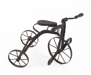 A vintage miniature tricycle, iron and wood, 20th century, ​24cm high