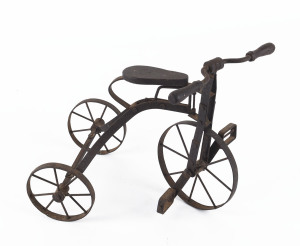 A vintage miniature tricycle, iron and wood, 20th century, 24cm high