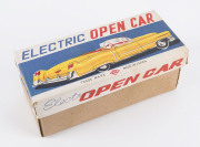 1950s convertible black Cadillac in original box "ELECTRIC OPEN CAR" by KKK, Japan; tinplate, battery driven, rubber tyres, steering wheel and on/off switch on dashboard. Length: 18cm (7"). - 5