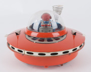 YOSHIYA SKY PATROL FLYING SAUCER circa 1965When it hits an object, the beautifully lithographed female astronaut/pilot moves the levers and steers her flying saucer in a new direction. "K.O." in a diamond trademark on the back of the seat. Battery operate - 4