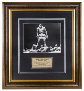 MUHAMMAD ALI signed photograph depicting "The sports photo of the century" - the moment he knocked out Sonny Liston, Round 1, 25th May, 1965. Framed and glazed, with Superstars & Legends Guarantee of Authenticity sticker and certificate. Overall 57 x 54cm.